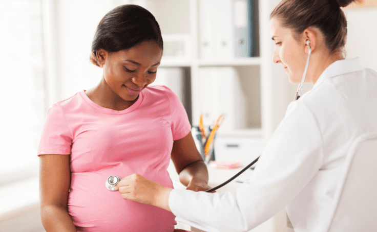 pregnant woman gets checkup