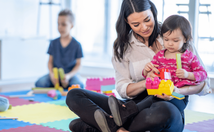 childcare holding child