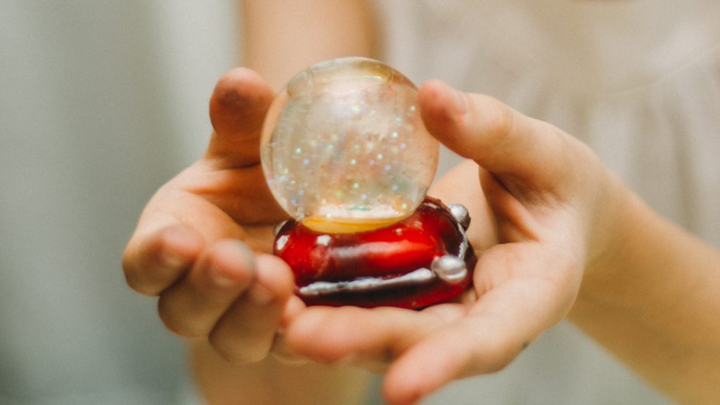 glitter ball in hands