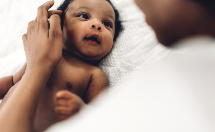 A mother looking at her infant